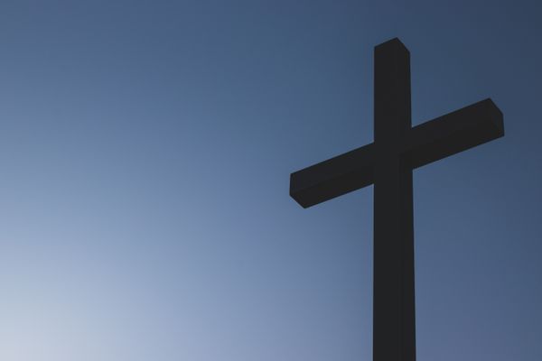 A cross against a blue sky.